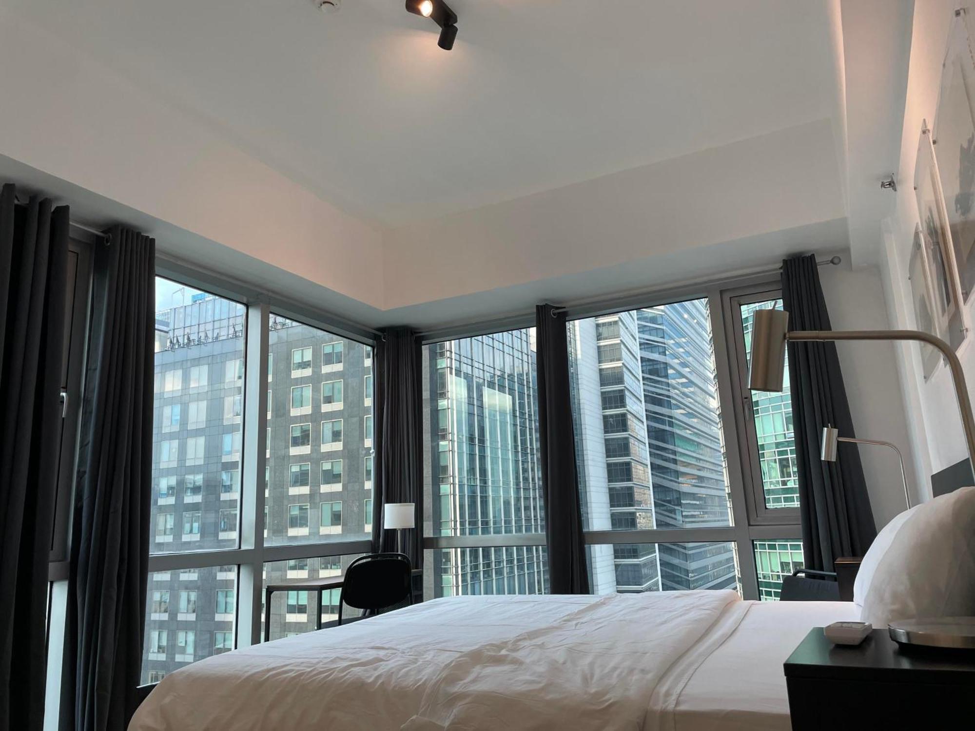 Prime Avant Bgc Location Apartments By Ph Staycation Манила Екстериор снимка