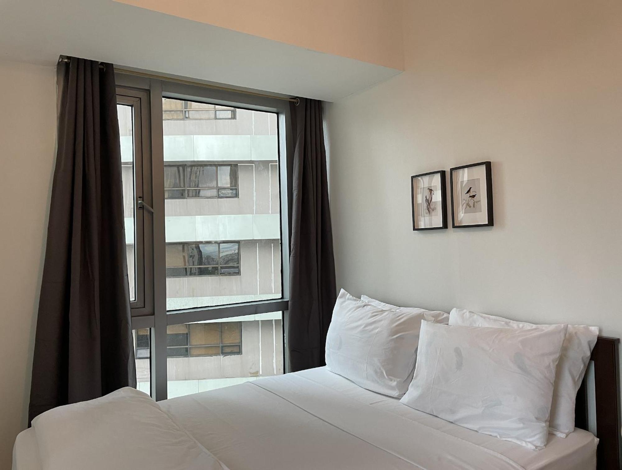 Prime Avant Bgc Location Apartments By Ph Staycation Манила Екстериор снимка